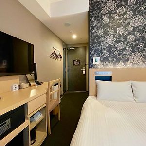 Kamer met een Queen Size Bed
